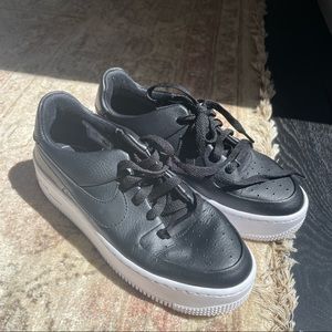 Nike Air Force 1s Platforms in black leather